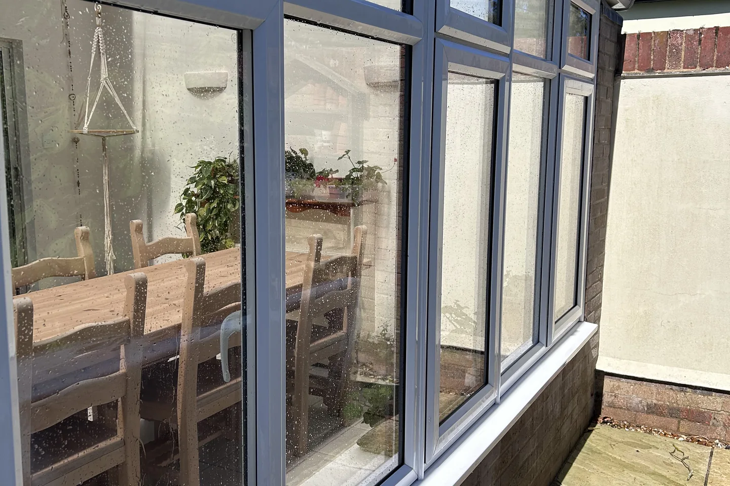 Conservatory windows cleaned, seen from the garden