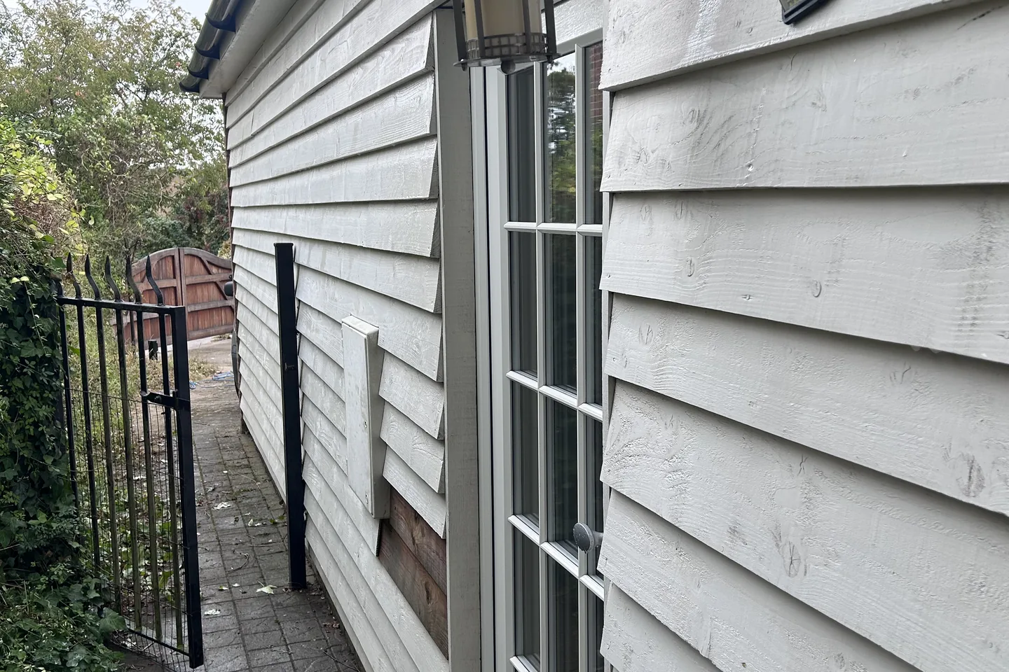 Painted timber cladding and fascias after cleaning